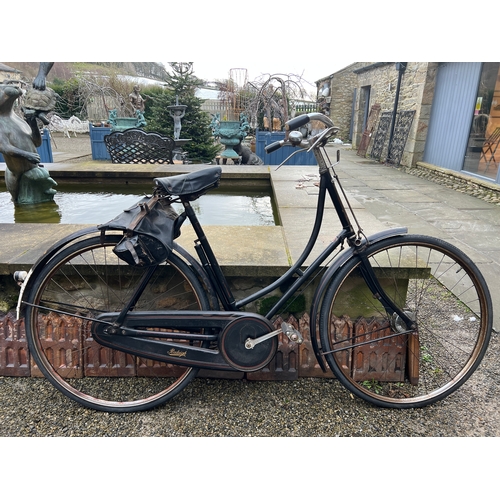 314 - Vintage ladies Raleigh loop frame bike complete with pump, leather saddle bag and sprung leather sad... 