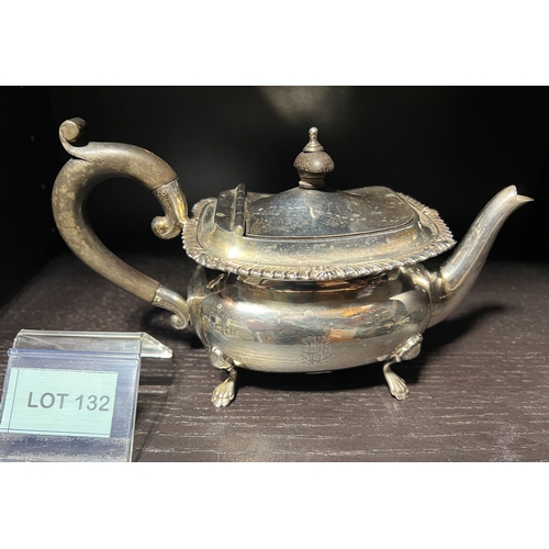 132 - Solid silver London made teapot with wooden handles and Lion paw feet total weight 307g