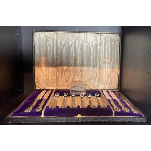 145 - Set of boxed silver handled knives and fish forks in original box that’s embossed with “Manchester” ... 