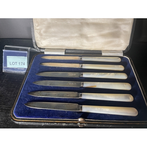 174 - Set of six box solid silver bladed and mother-of-pearl handled knives. In original box  Total weight... 