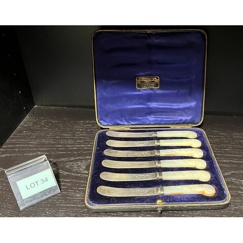 34 - Set of six case mother of Pearl handled and solid silver bladed butter knives box marked Halifax tot... 