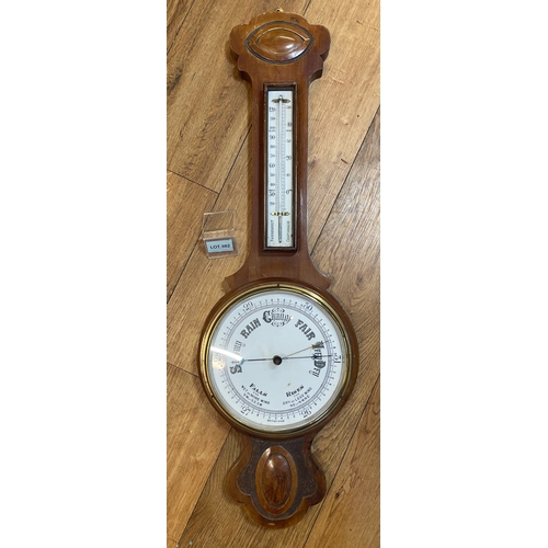 382 - Carved oak and brass British made barometer