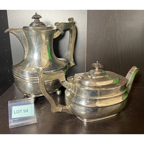 94 - London made solid silver teapot along with a London made solid silver coffee pot with wooden handles... 