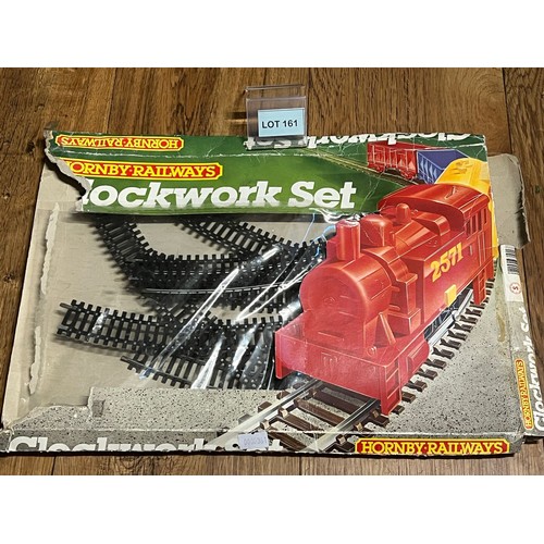 161 - Hornby Railways clock work set. Train track