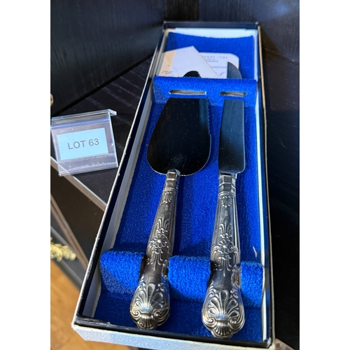 63 - Silver handled carving sets