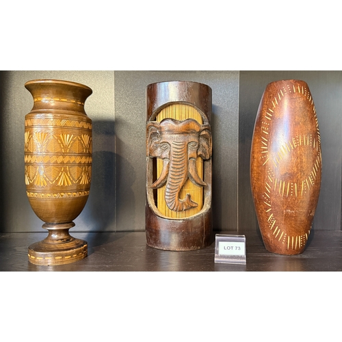73 - Two wooden vases and a wooden elephant lamp
