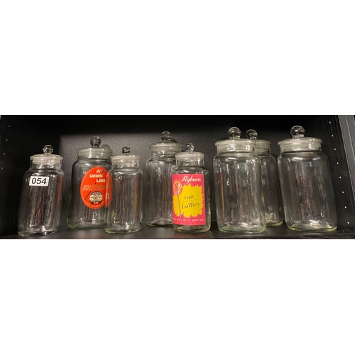 54 - Eight jars with original glass stoppers