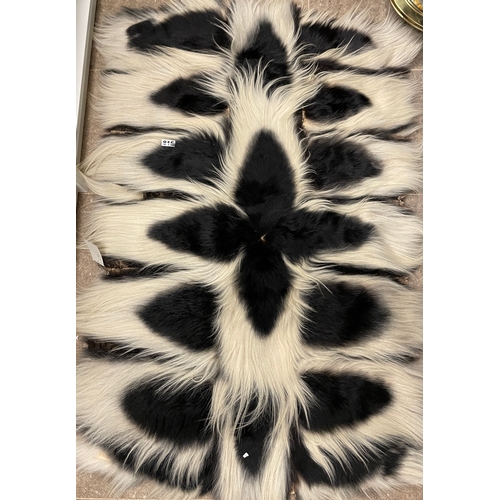 815 - Real Taxidermy rug made of (possible Colobus) monkey pelts