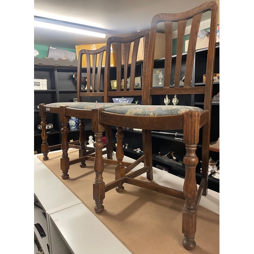 823 - Set of three oak chairs with easy removable seats and carved top decoration