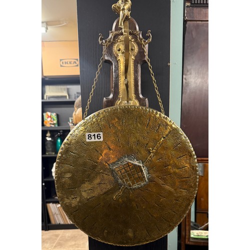 816 - Decorative brass gong complete with cherub