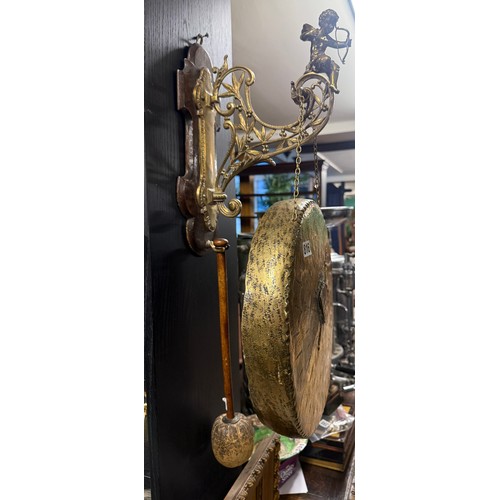 816 - Decorative brass gong complete with cherub