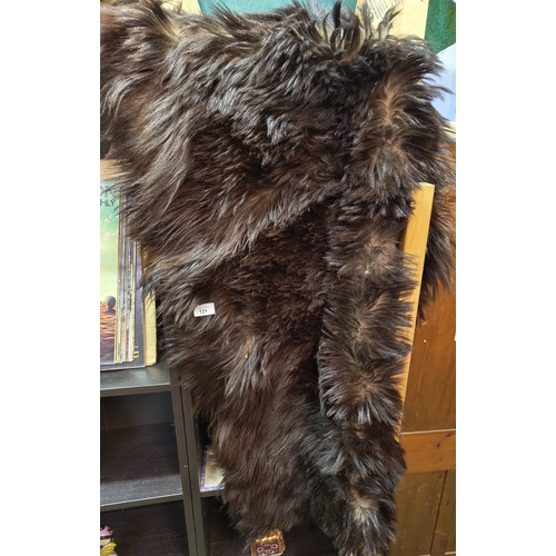 dark brown goatskin rug/ throw