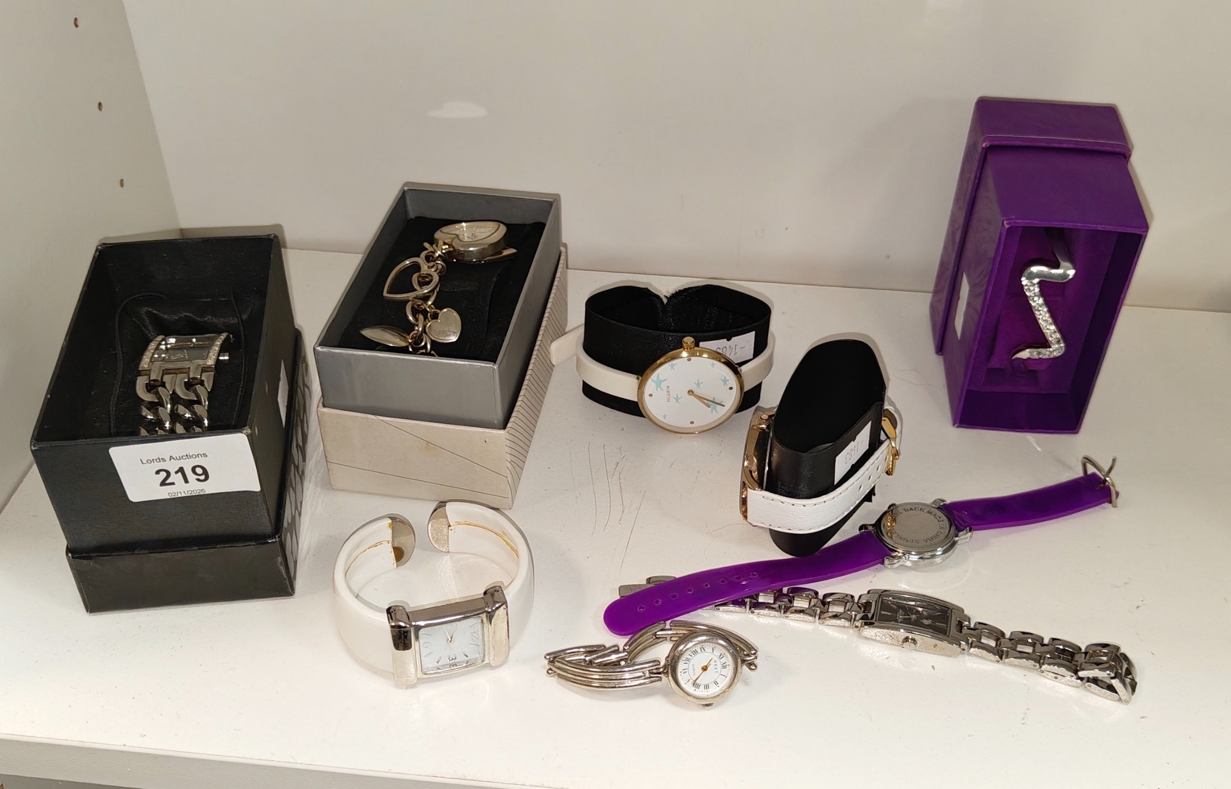 collection of ladies watches and bracelet