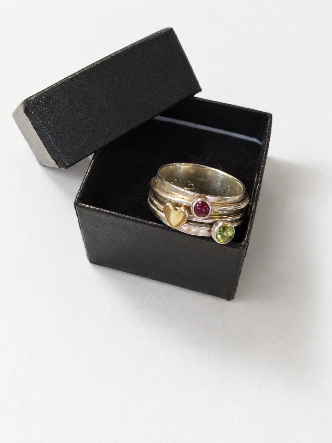 Lexi Cannon hand-made large silver ring set with peridot and garnet ...