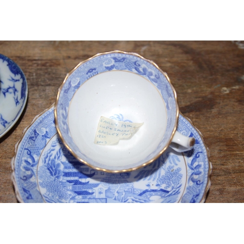 121 - 19TH CENTURY BLUE AND WHITE TEA BOWL AND SAUCER AND ONE OTHER