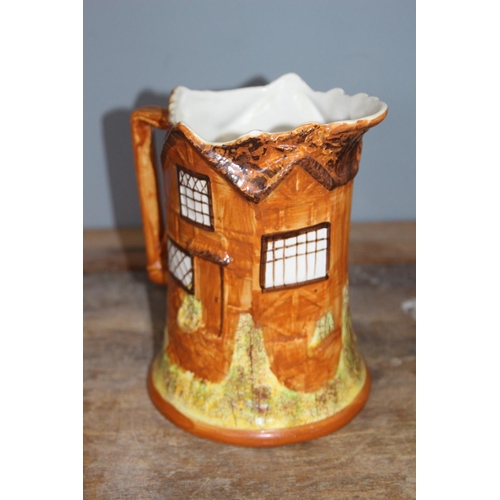 129 - PRICE COTTAGE WARE JUG
20CM