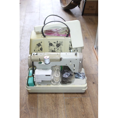 236 - VINTAGE JONES SEWING MACHINE