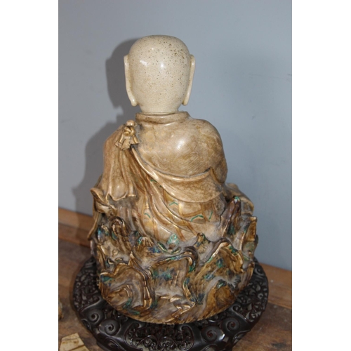 553 - ANTIQUE BUDDA ON STAND A/F
37CM
HAND BROKEN