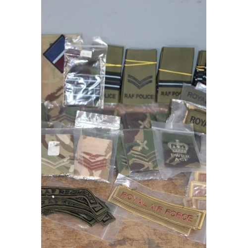 593 - LARGE BOX OF RAF INSIGNIA AND EPAULETTES