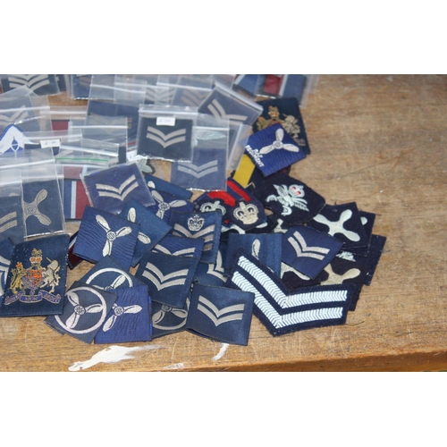 596 - LARGE QUANTITY OF RAF BADGES