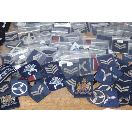 596 - LARGE QUANTITY OF RAF BADGES