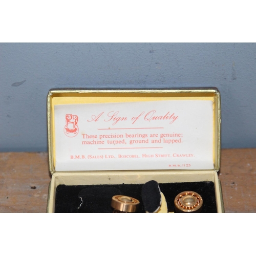 638 - PAIR OF BEARING CUFFLINKS