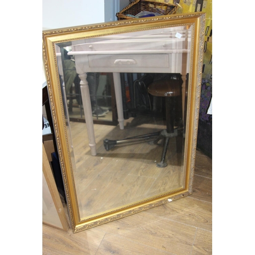 75 - GILT FRAMED BEVELLED EDGED MIRROR
99CM X 69CM