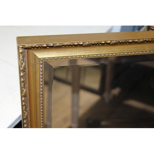 75 - GILT FRAMED BEVELLED EDGED MIRROR
99CM X 69CM