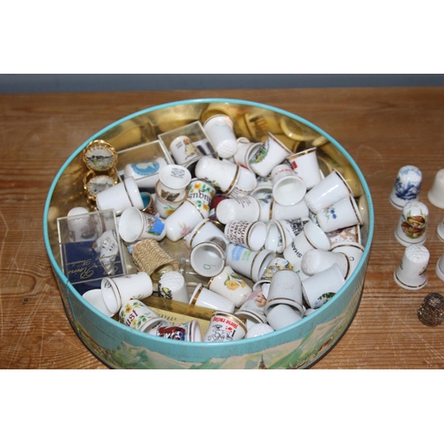 244 - TIN OF THIMBLES