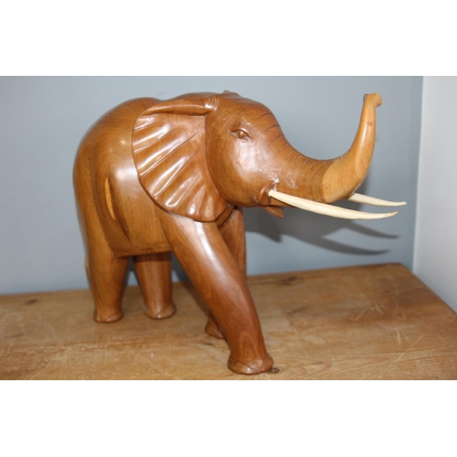 252 - LARGE WOODEN ELEPHANT
32CM