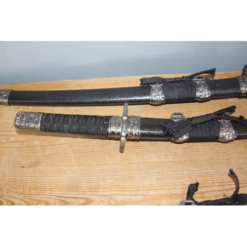 429 - 3 X ORIENTAL SWORDS
LONGEST 60CM