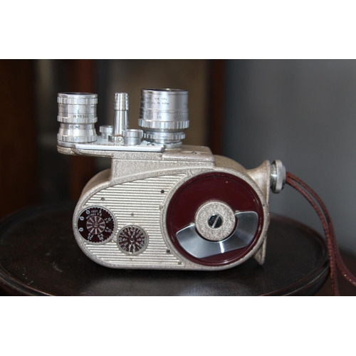 498 - BELL & HOWELL 605 CINE CAMERA AND CASE