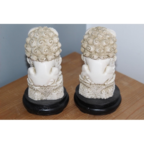 558 - PAIR OF ALABASTER TEMPLE DOGS
16CM