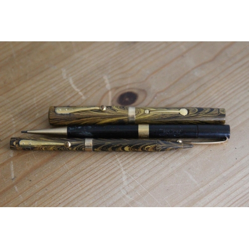 581 - VINTAGE WATERMANNS FOUNTAIN PEN AND PENCIL WITH 9CT GOLD AND A FYNEPOYNT PENCIL WITH 18ST GOLD BAND