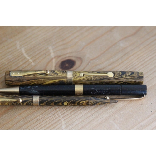 581 - VINTAGE WATERMANNS FOUNTAIN PEN AND PENCIL WITH 9CT GOLD AND A FYNEPOYNT PENCIL WITH 18ST GOLD BAND