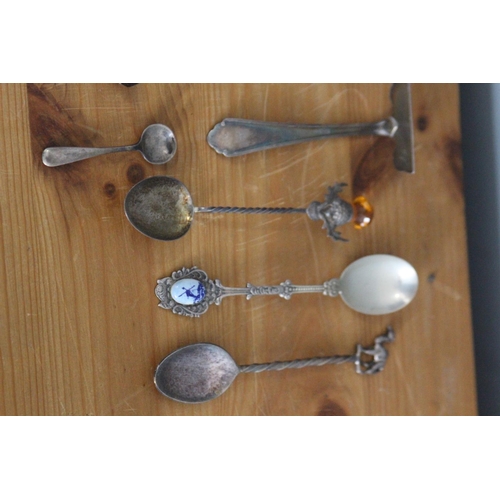 593 - QUANTITY OF ORNATE SLIVER SPOONS, SOME FOREIGN