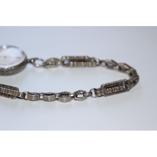 672 - LADIES SILVER FOB WATCH AND CHAIN