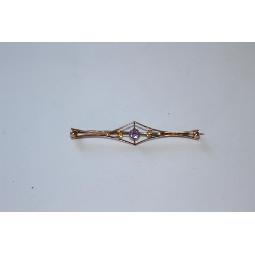 683 - 9CT GOLD AND AMETHYST BROOCH