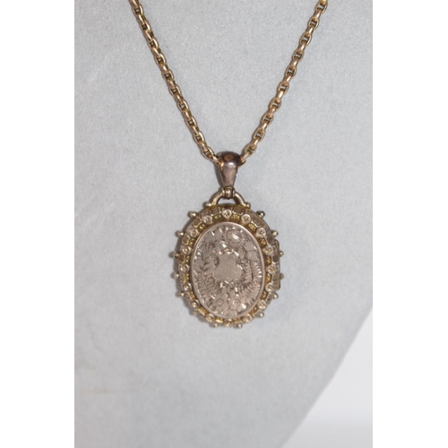 686 - 9CT GOLD CHAIN AND LOCKET 15grams