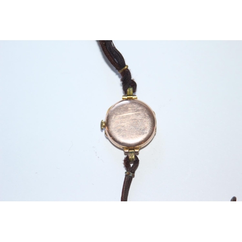 693 - 9CT GOLD WATCH