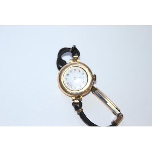 694 - 15CT GOLD WATCH