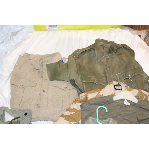 397 - QUANTITY OF MILITARY CLOTHES - 11 PIECES