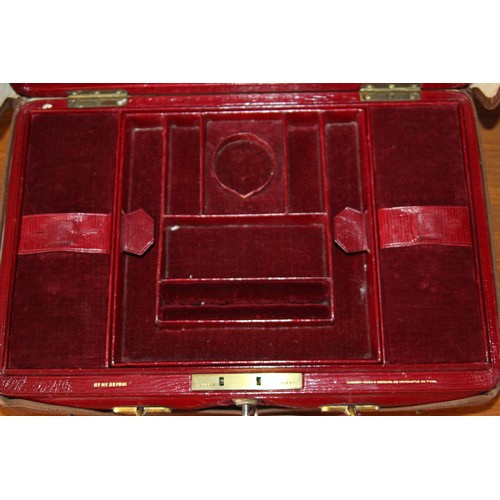 728 - ANTIQUE LEATHER JEWELLERY CASE