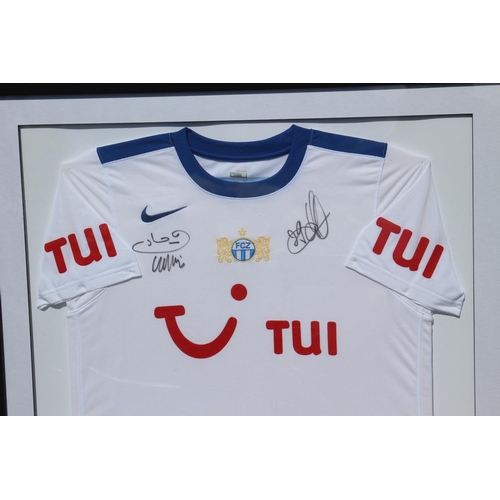 212 - FRAMED SIGNED F C ZURICH FOOTBALL SHIRT
87 X 82CM