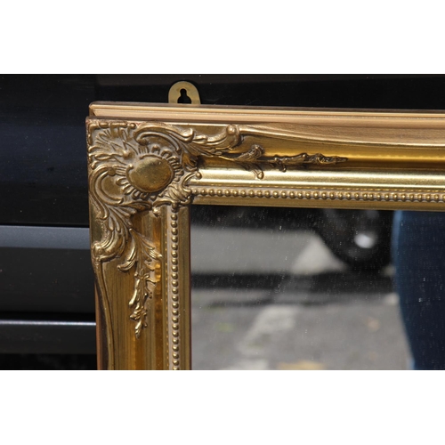 220 - GILT FRAMED MIRROR
65 X 91CM