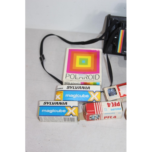 440 - POLAROID CAMERA AND FILM