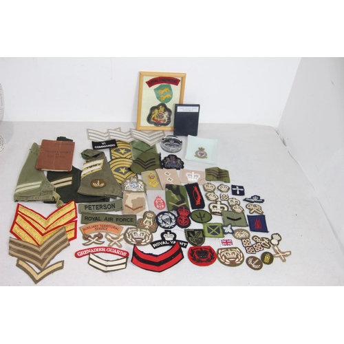 666 - BOX OF ASSORTED MILITARY BADGES