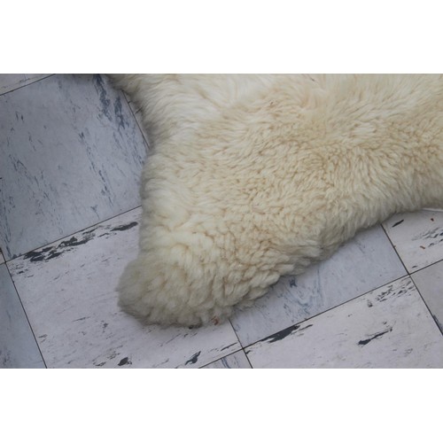 249 - ANIMAL RUG AND ONE OTHER
123 X 75CM