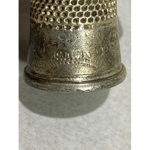 899 - 2 X THIMBLES 1 X SILVER MARKED CH AND 1 X SILVER PLATE MARKED CH DORCAS
2.5CM