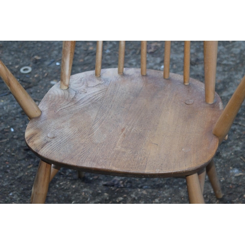 102 - PAIR OF BLONDE ERCOL GOLDSMITH CARVERS 
63 X 45 X 100CM